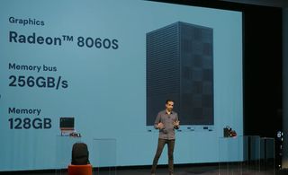 A screenshot of the CEO standing with the Framework Desktop in view